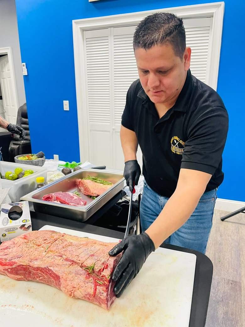 Ronaldo trimming steak before an event